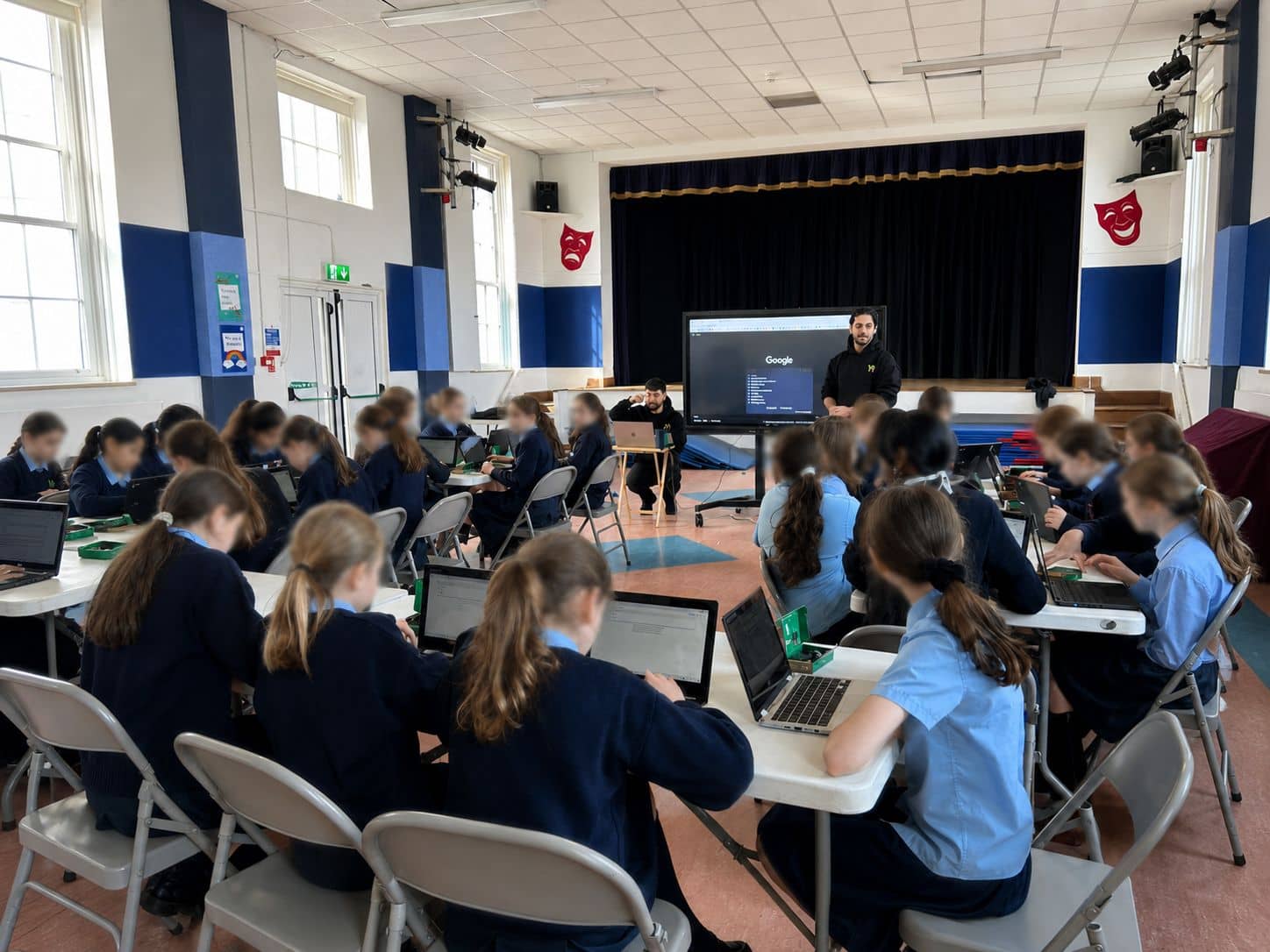 Large YoungMinds classroom partnership session with mentors and students